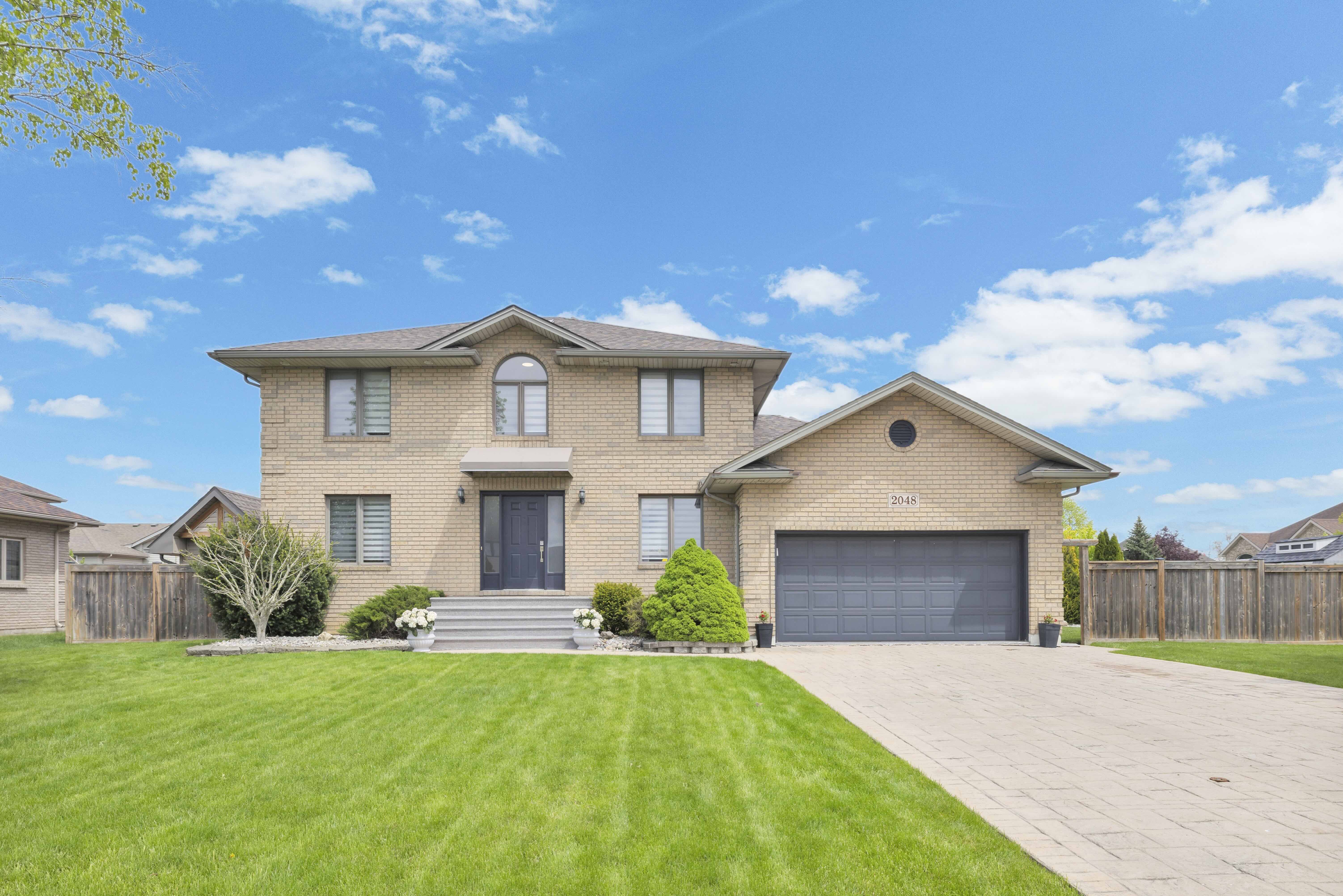 Front exterior — 2048 Eugeni, South Tecumseh