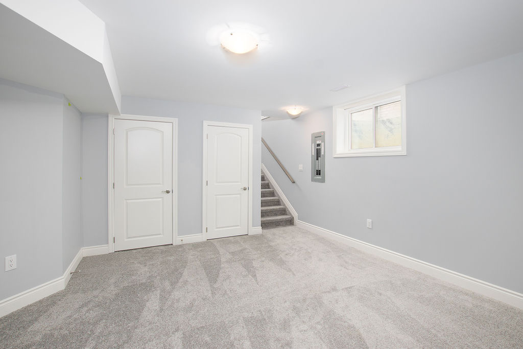 Basement staircase and utility access
