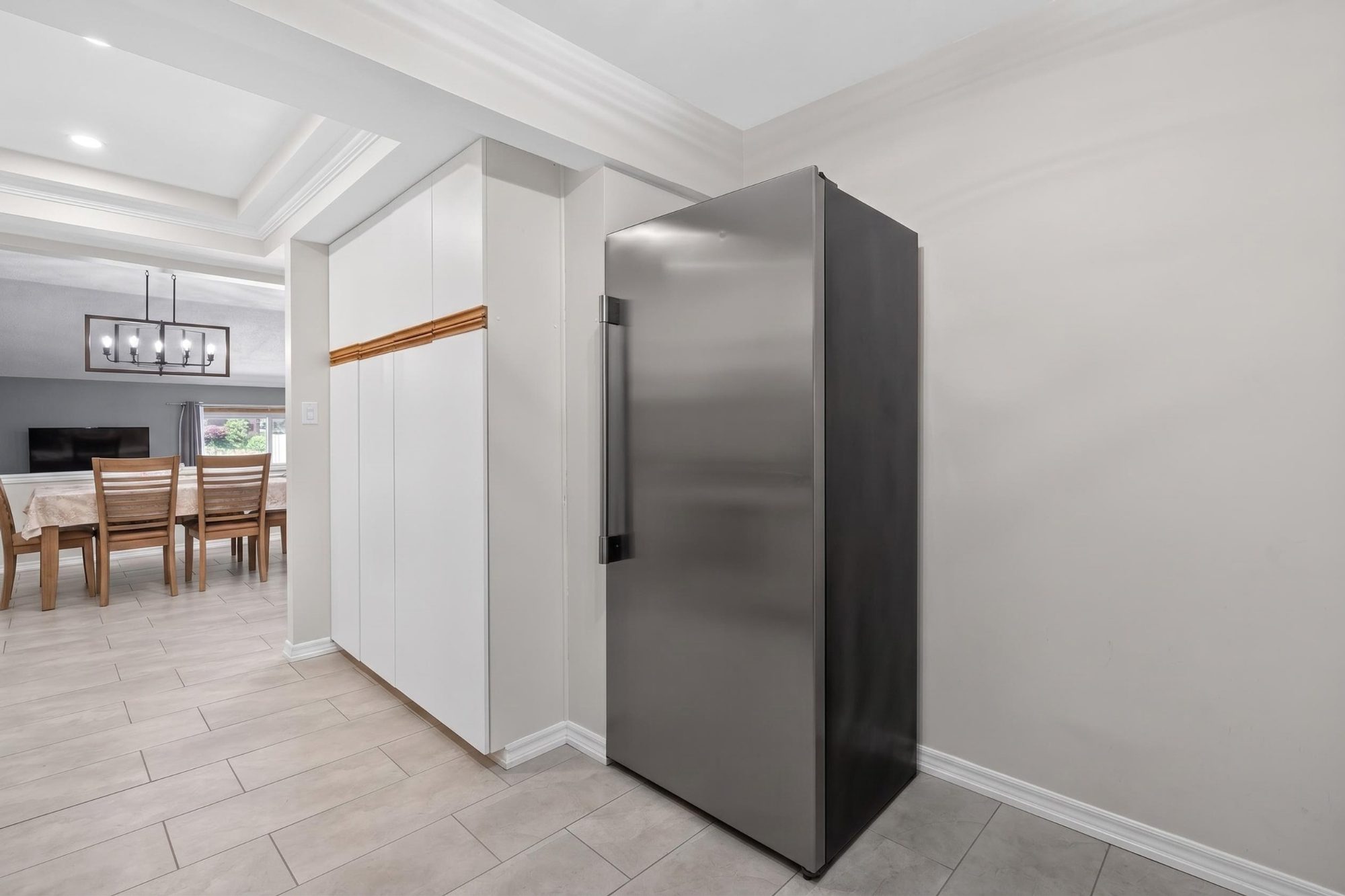Kitchen - refrigerator and pantry cabinets