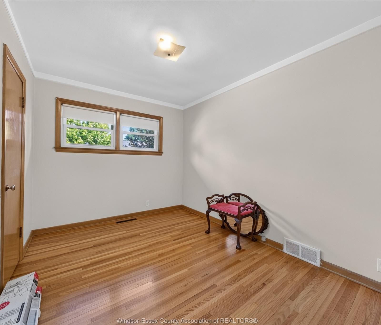 Bedroom with small horizontal window