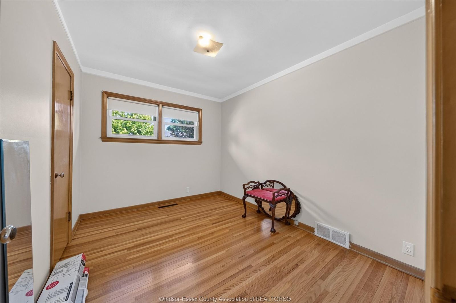 Bedroom with small horizontal window
