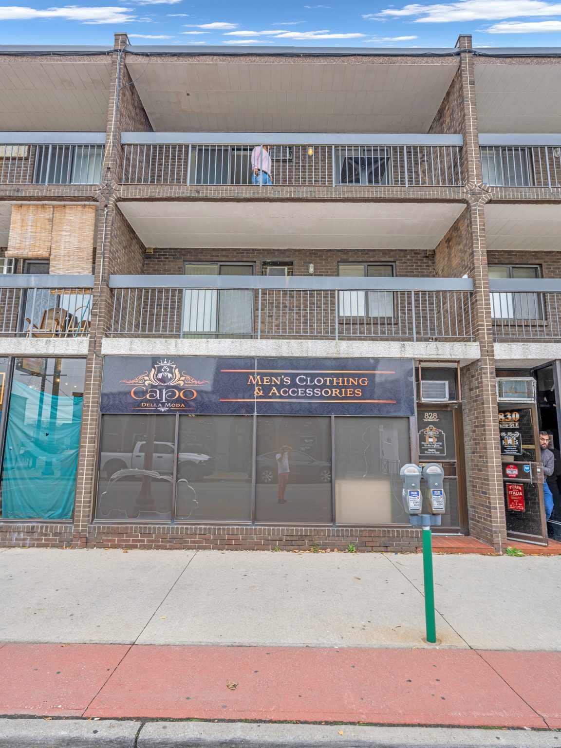 828 Erie Street East — three-storey brick commercial building on Windsor's Erie Street corridor