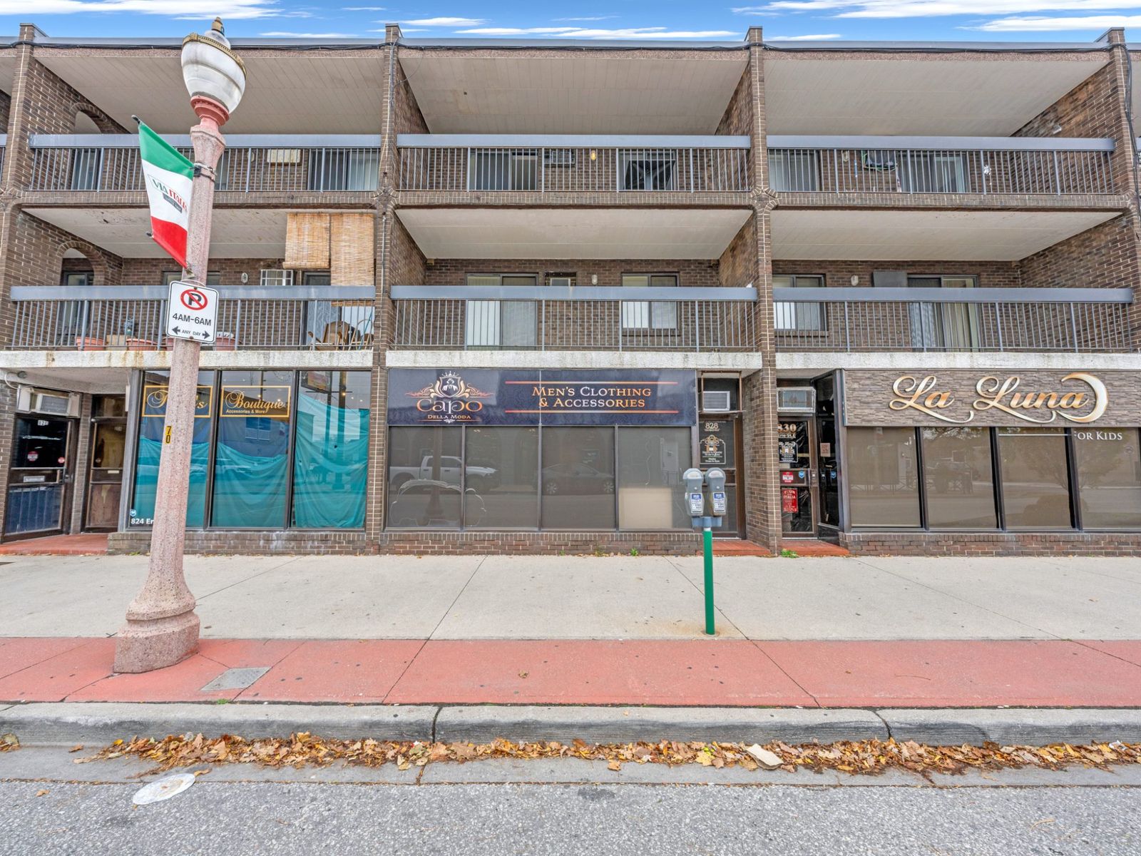 828 Erie Street East building facade with storefront windows and balconies above
