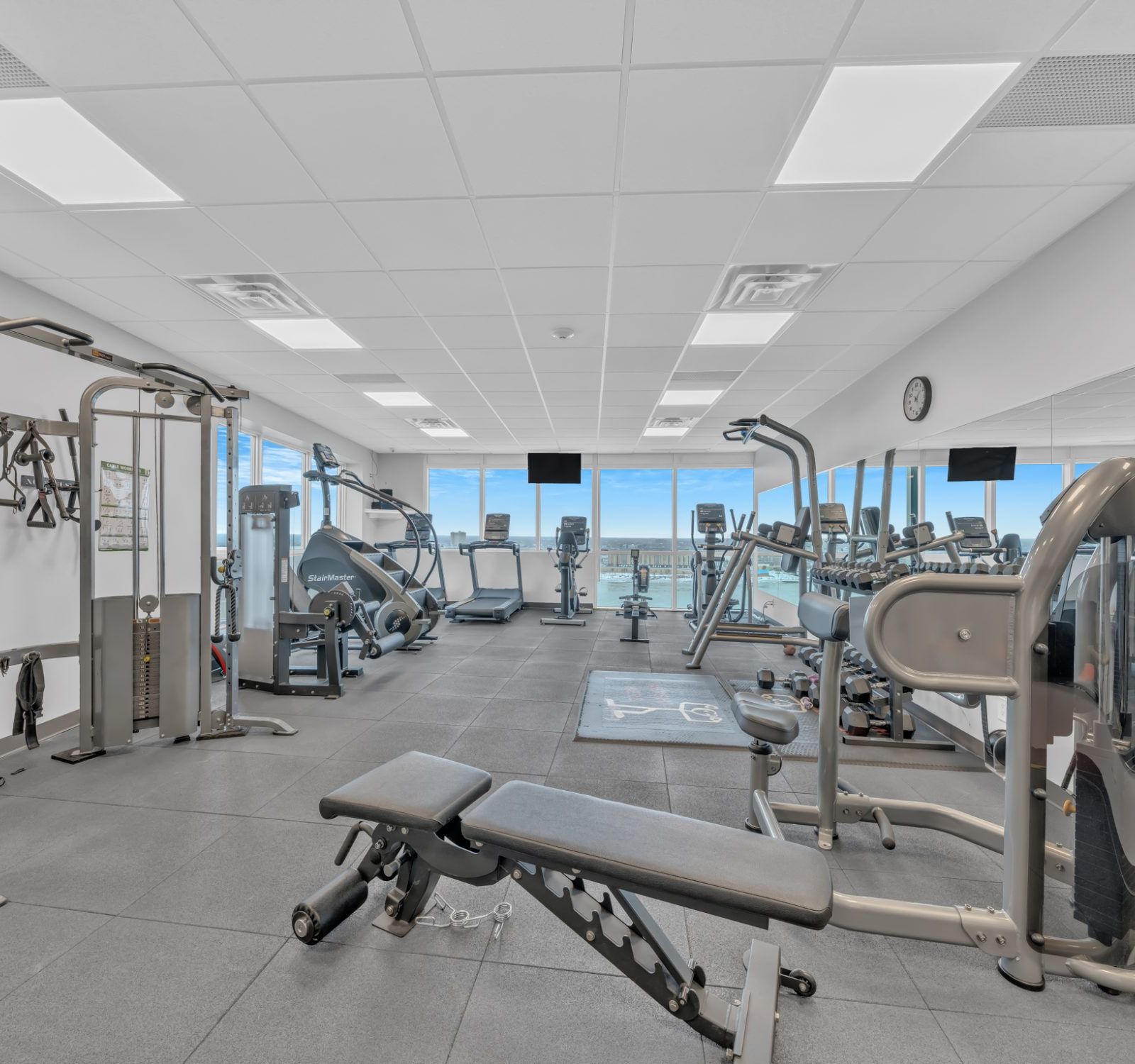 Fitness centre with cardio and weight equipment overlooking the river