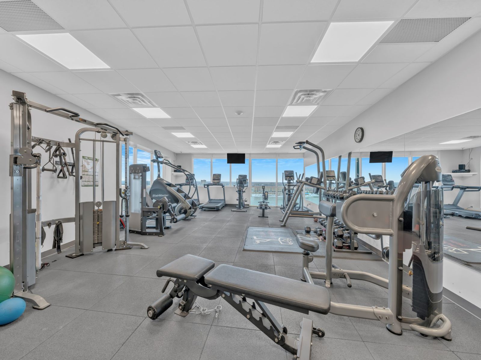 Fitness centre with cardio and weight equipment overlooking the river