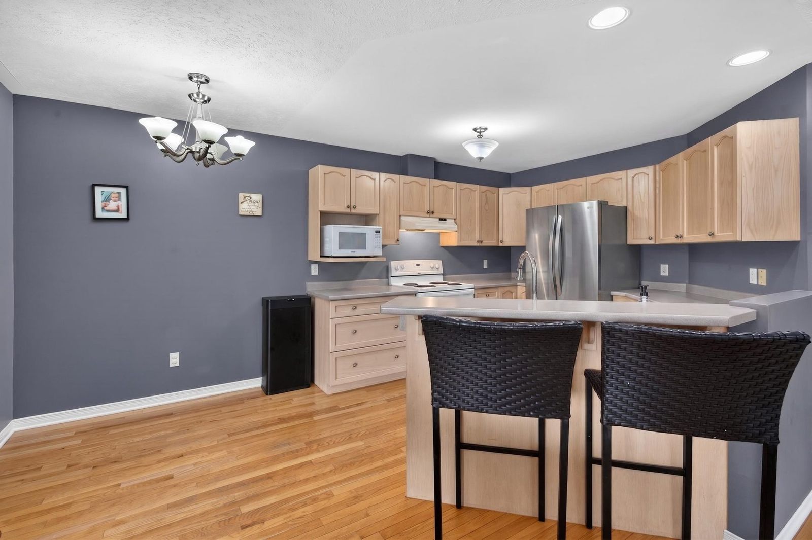 Kitchen and dining area with chandelier