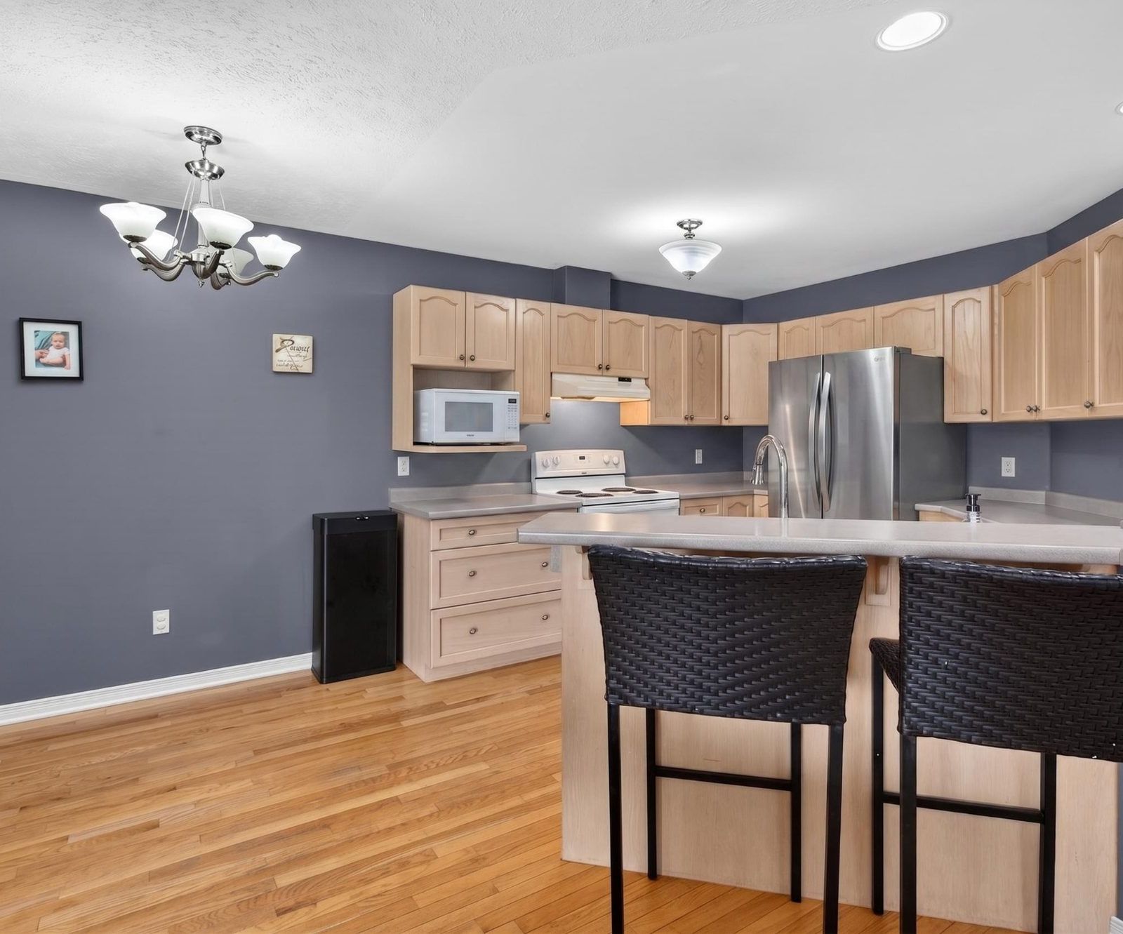 Kitchen and dining area with chandelier