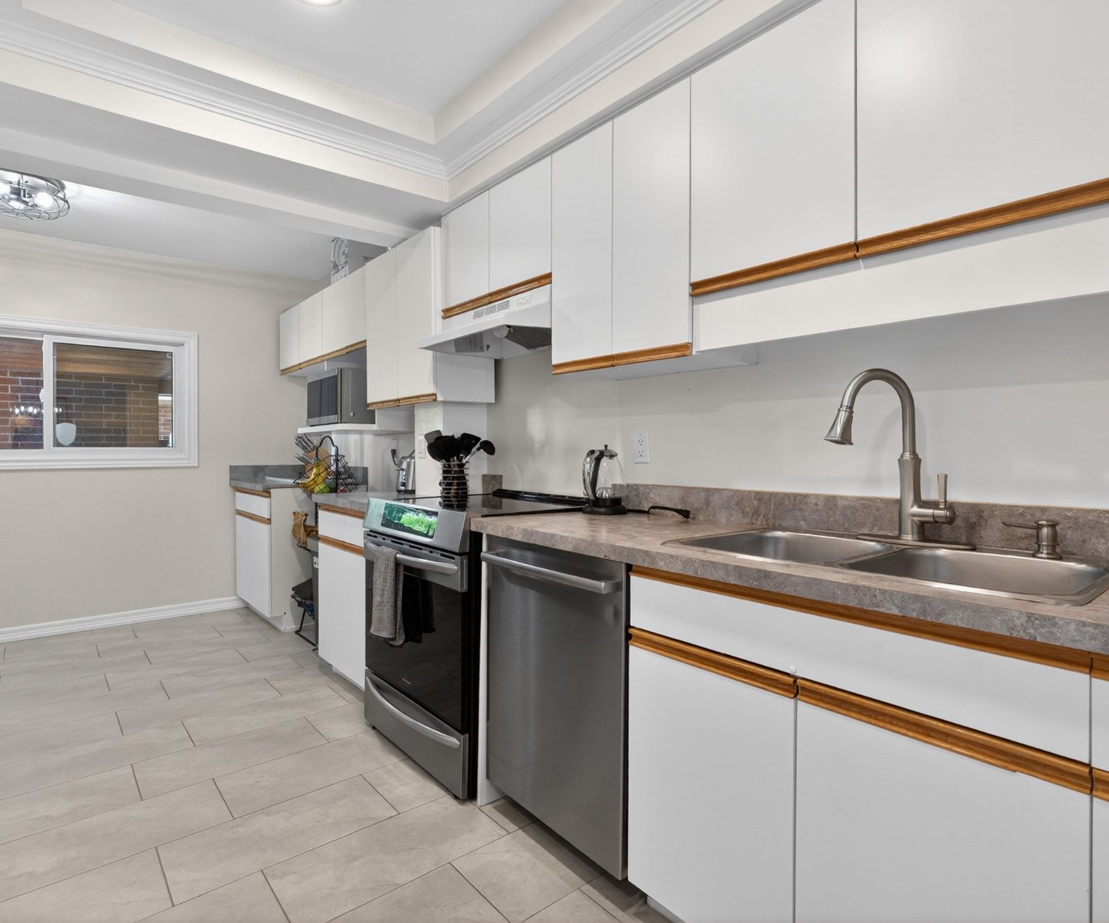 Kitchen - full view with stainless appliances