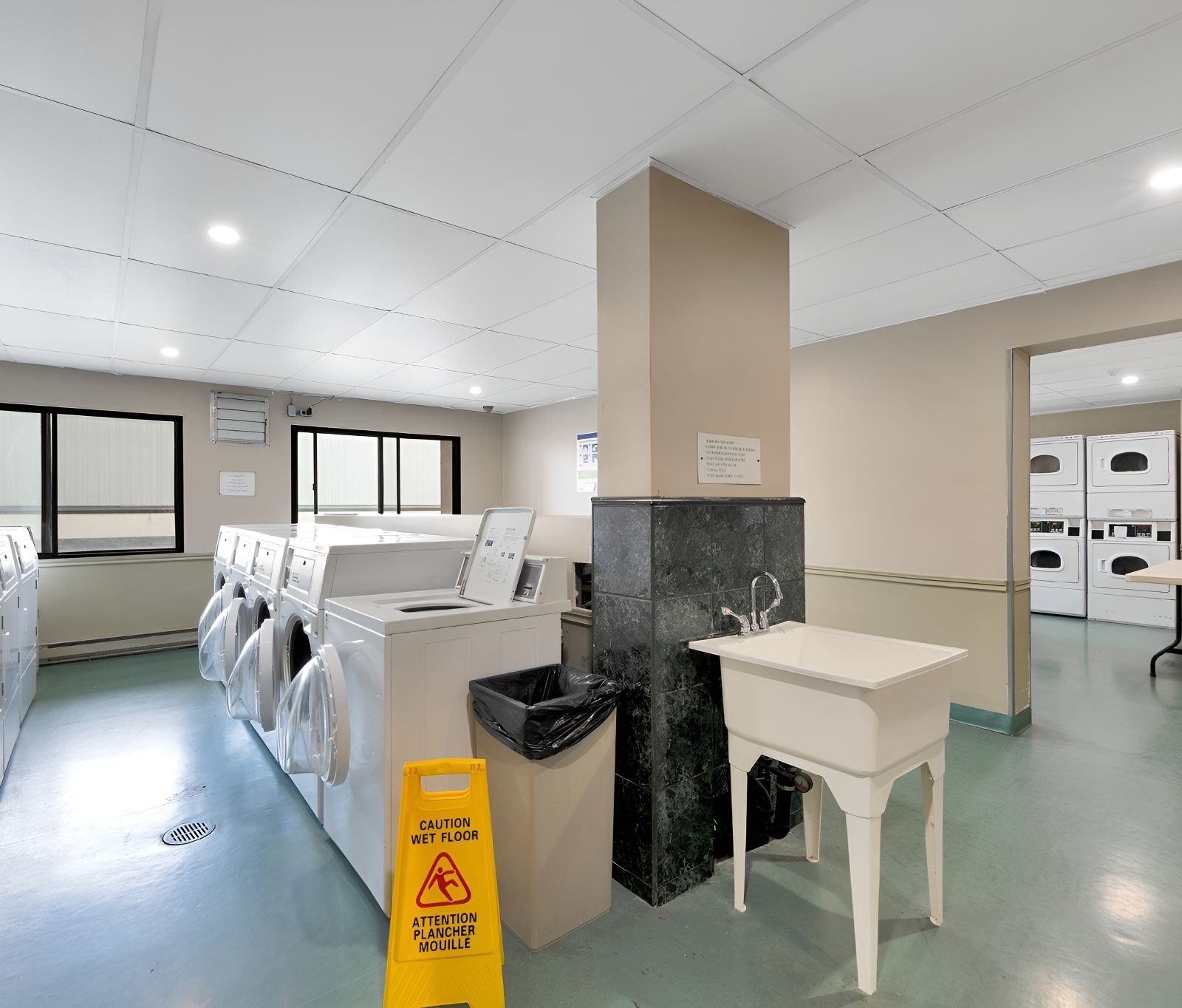 Laundry room with washers and dryers