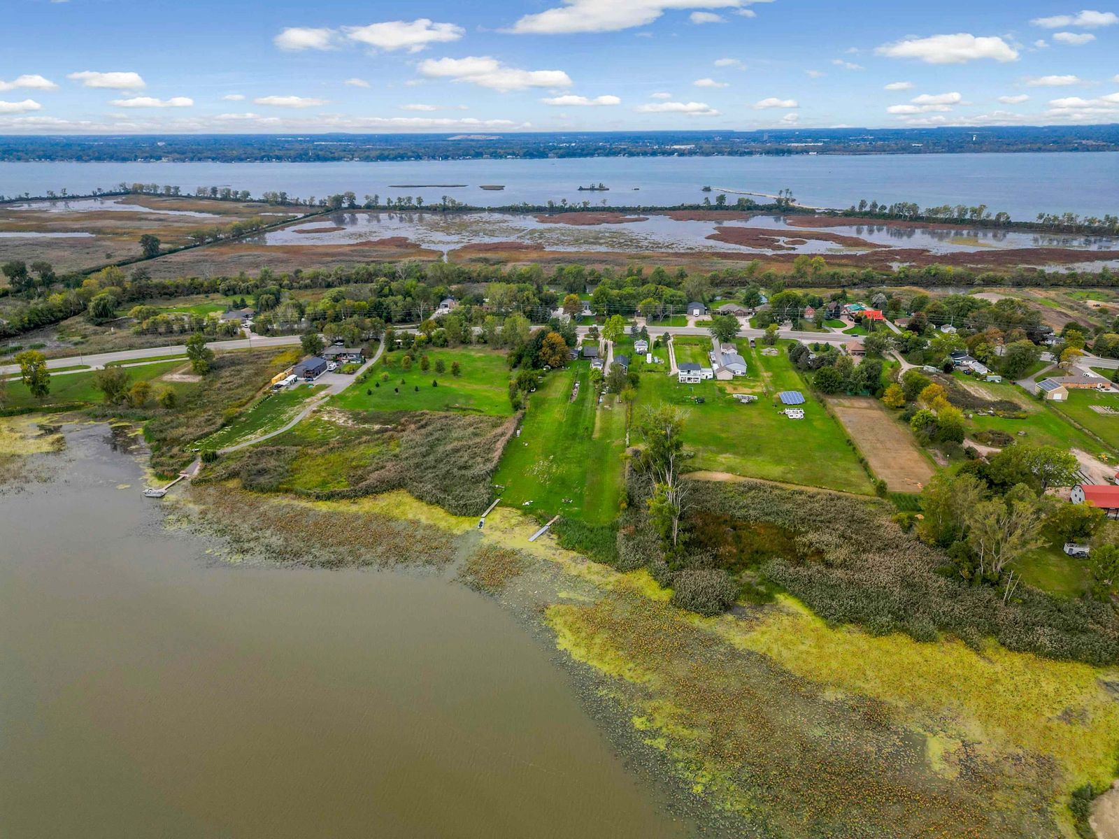 Aerial view of the shoreline and open water.