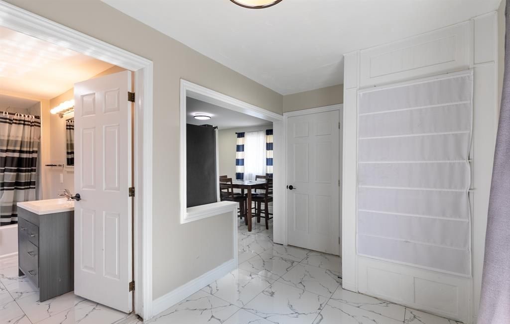 Hallway with open doorways.